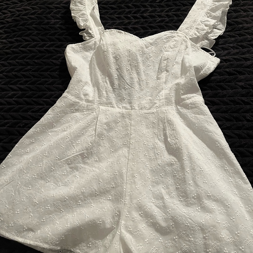 Women’s size M white eyelet short romper.